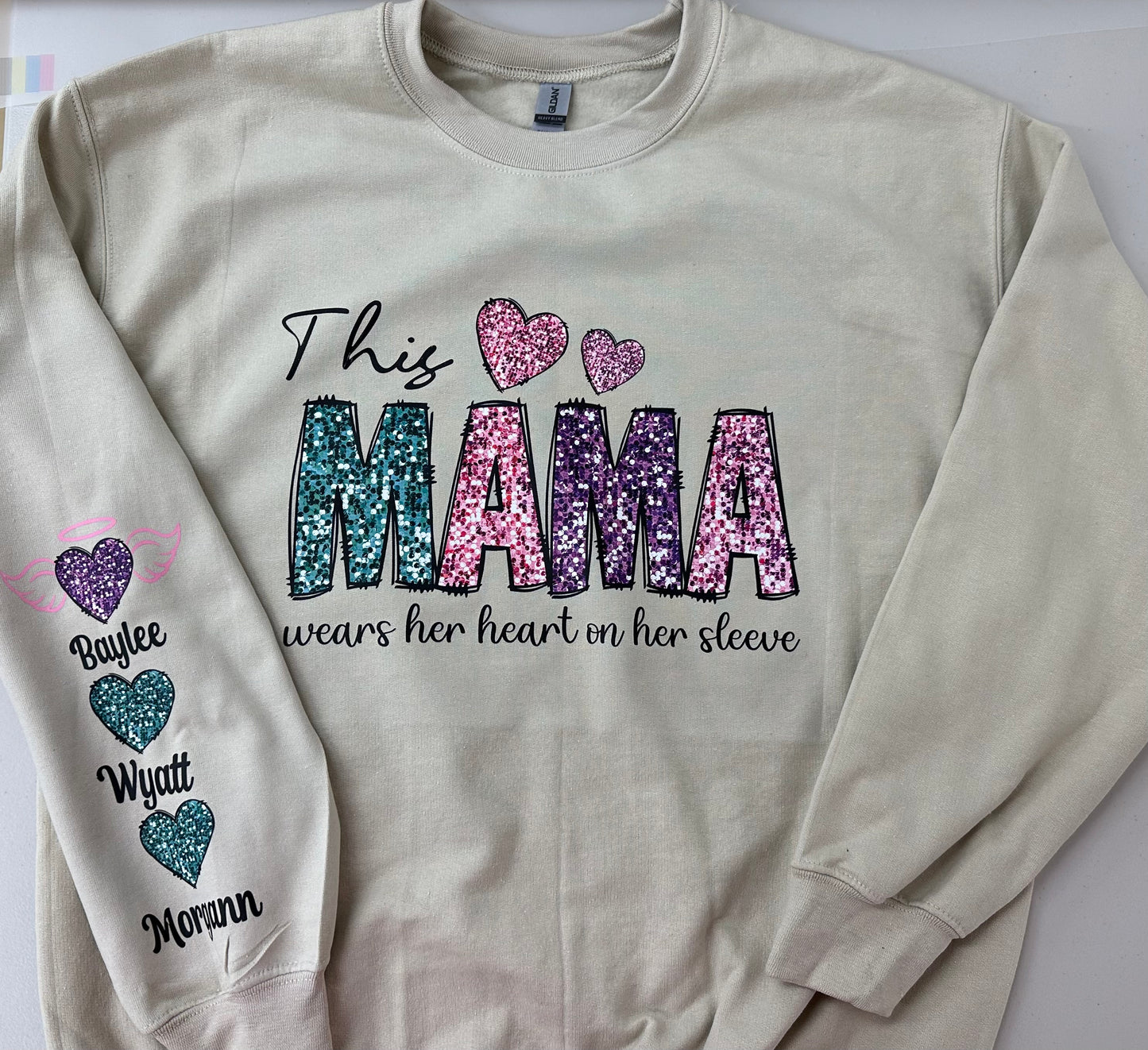 Mama heart on her sleeve